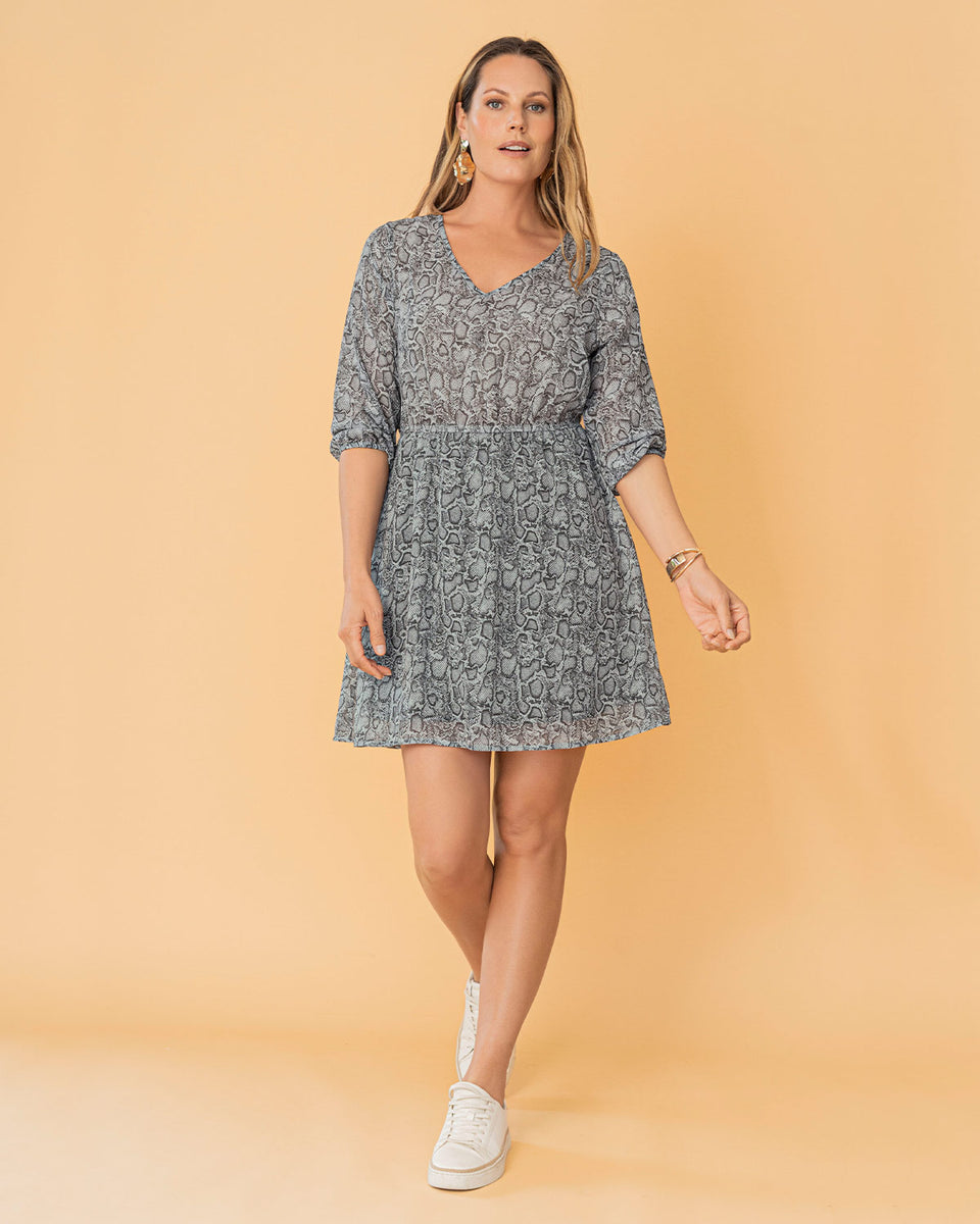 Vestido corto estampado con elástico en mangas y cintura