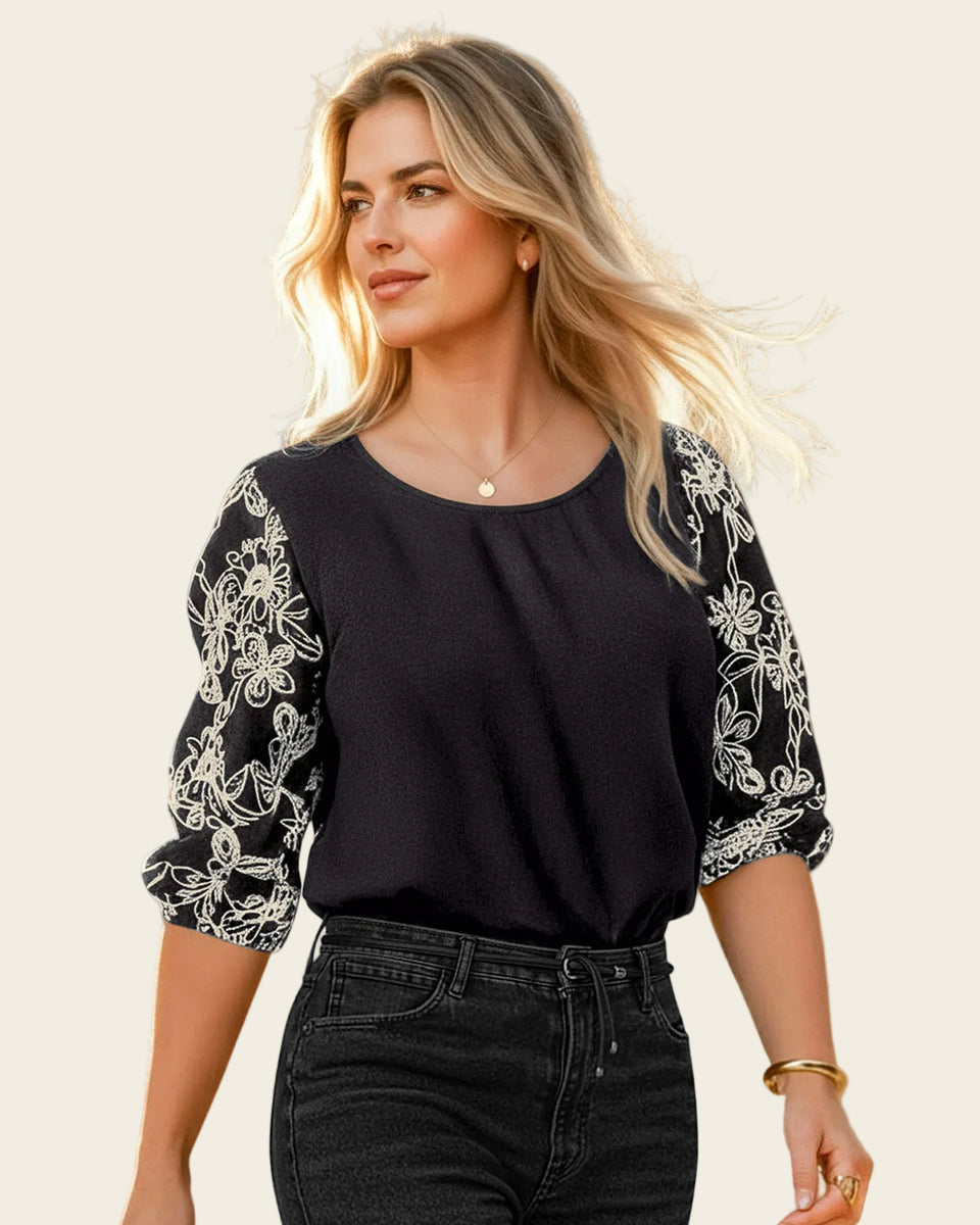 Blusa con mangas en tela bordada