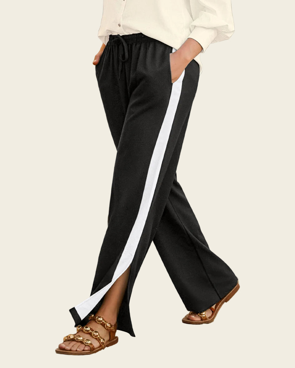 Pantalón bota ancha con aberturas a los lados