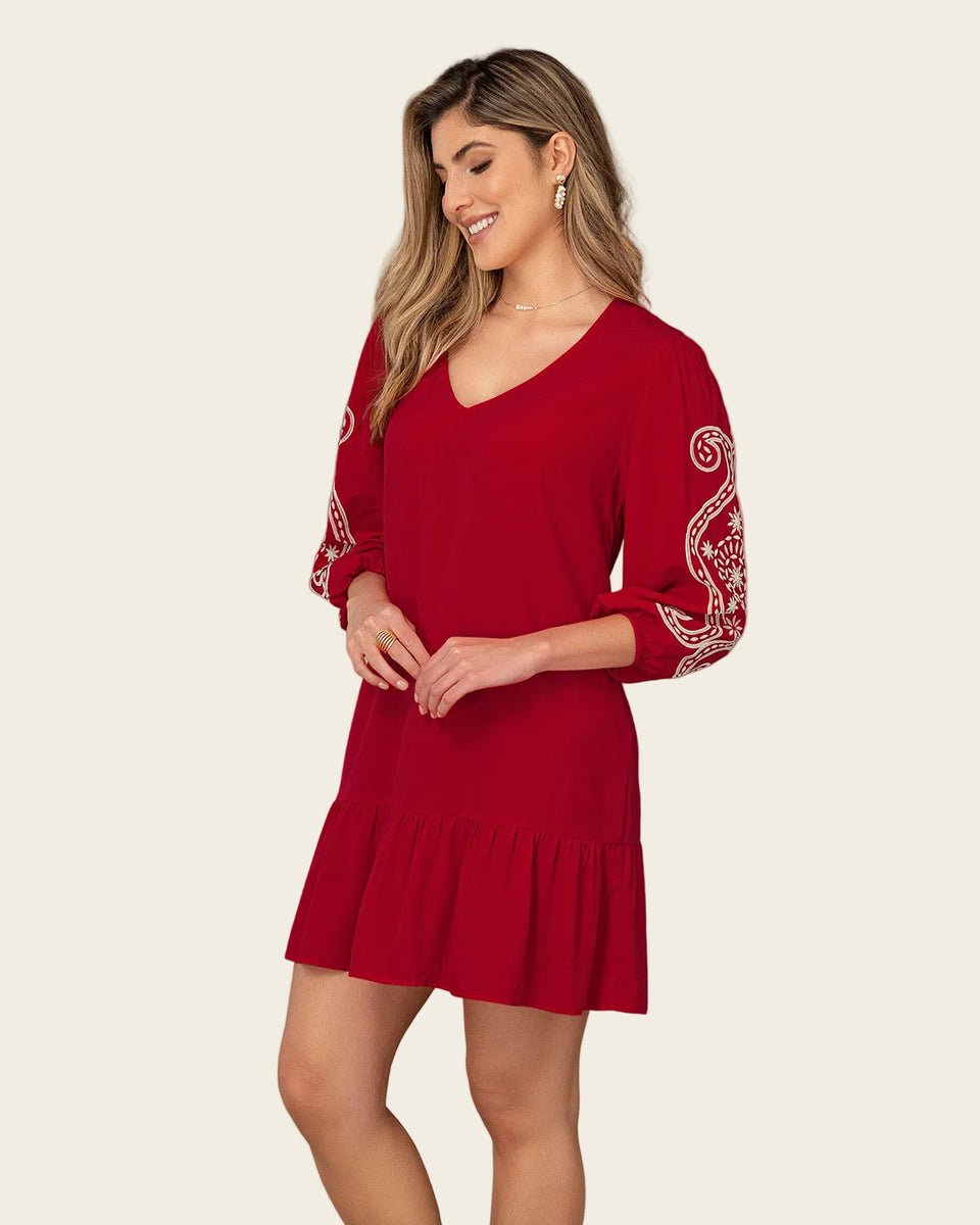 Vestido corto con estampado en mangas