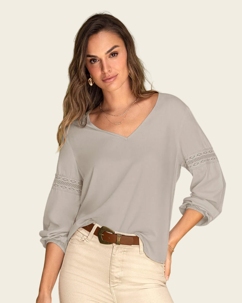 Blusa con detalle tipo encaje en mangas