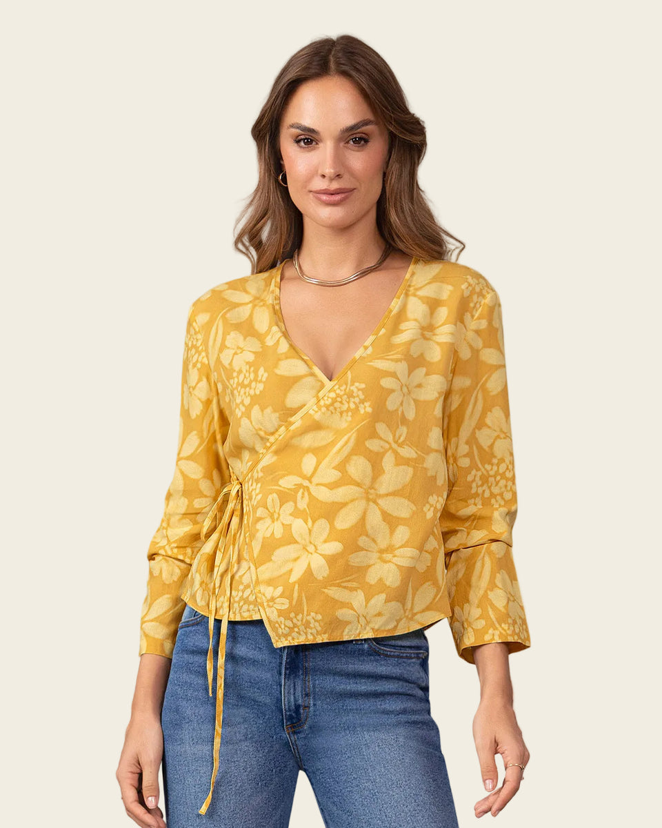 Blusa manga larga de diseño cruzado en frente