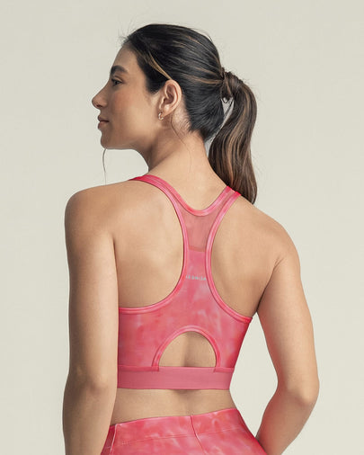 Top deportivo con espalda atlética en material de secado rápido#color_040-estampado-rosado-degrade