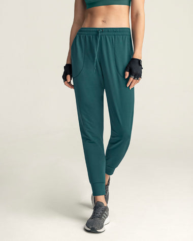 Jogger deportivo de silueta amplia con bolsillos#color_678-verde