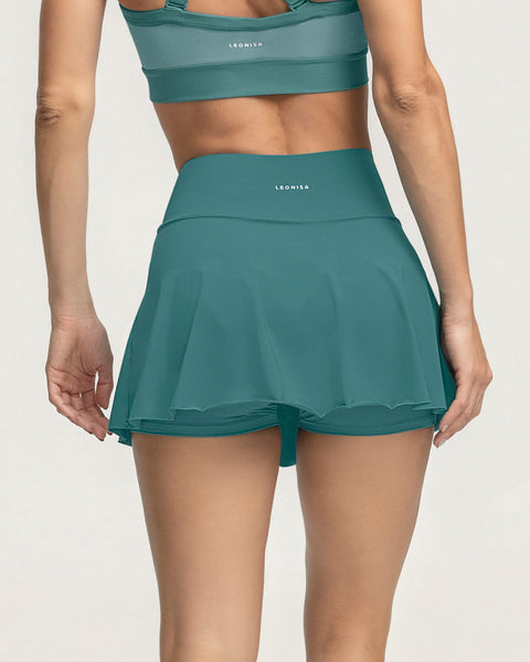 Falda deportiva con short interno con bolsillo#color_632-verde-medio