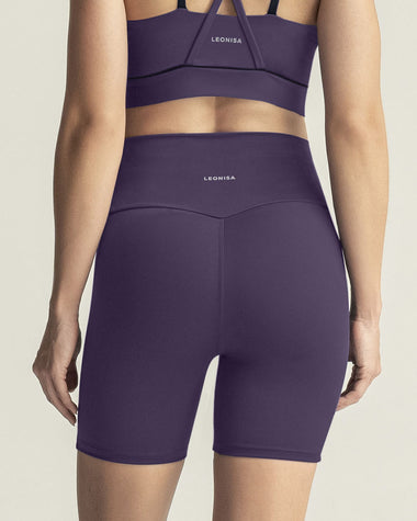 Short ciclista con bolsillo lateral y control de abdomen#color_450-morado