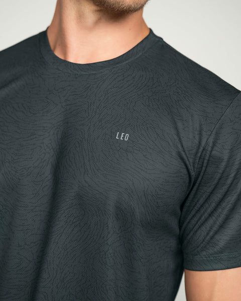 Camiseta deportiva masculina con tecnología de secado rápido#color_071-estampado-gris