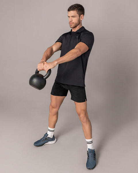 Camiseta deportiva transpirable con cuello tipo polo#color_700-negro