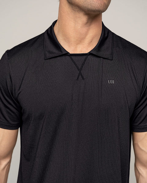 Camiseta deportiva transpirable con cuello tipo polo#color_700-negro