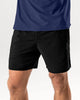 Short deportivo con bolsillo trasero y bóxer interno#color_700-negro