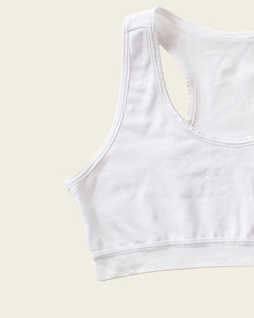 Top con espalda deportiva elaborado en algodón para niña#color_000-blanco