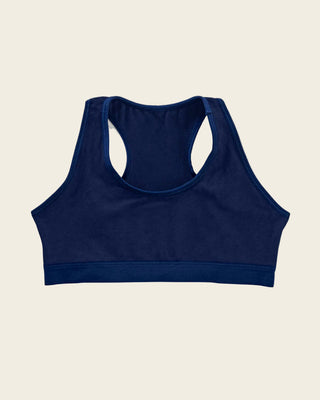 Top con espalda deportiva elaborado en algodón para niña#color_536-azul-oscuro