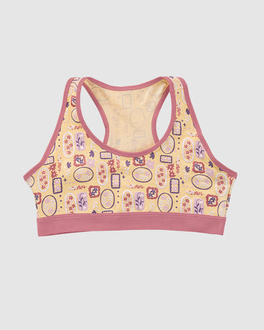 Top con espalda deportiva elaborado en algodón para niña#color_952-amarillo-estampado-flores
