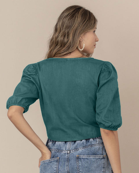 Blusa manga corta tipo crop con detalle de anudado en frente#color_063-verde-botella