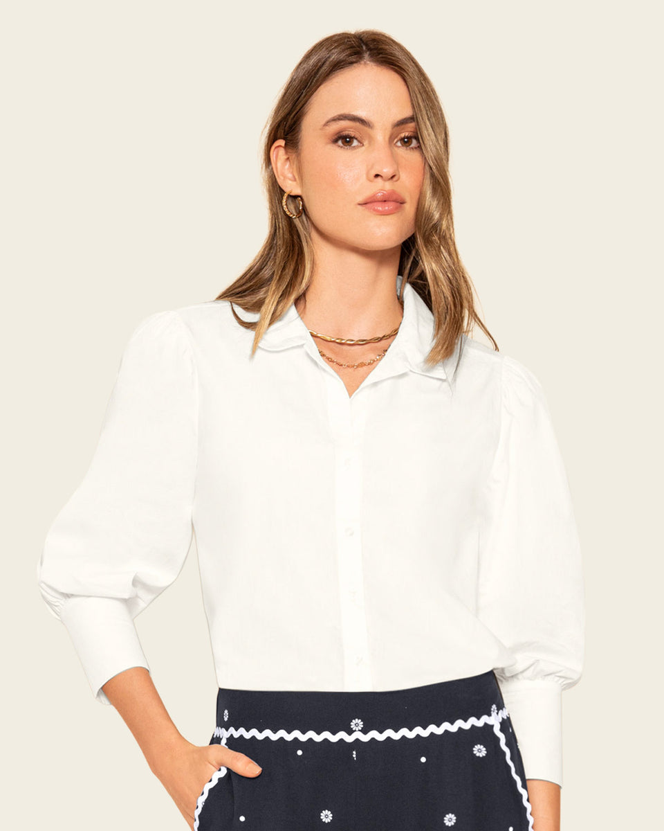 Blusa manga 3/4 con botones funcionales y recogido en hombros