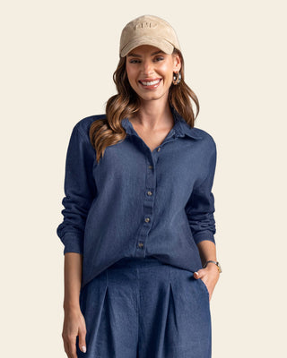 Blusa manga larga de cuello camisero con botones funcionales en frente#color_024-azul-osc