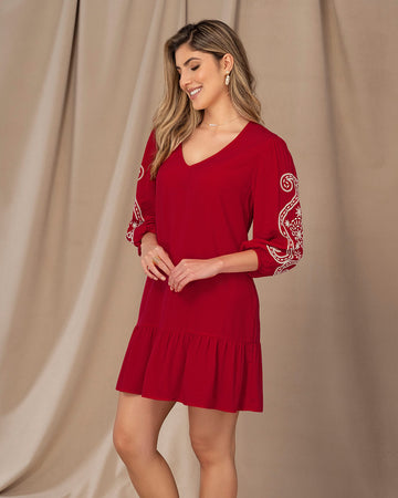 Vestido corto con estampado en mangas#color_c35-rojo-osc
