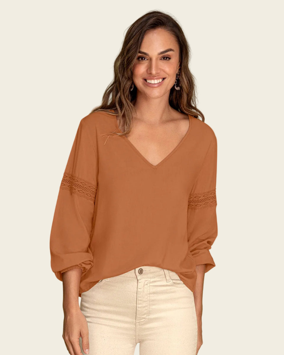 Blusa con detalle tipo encaje en mangas