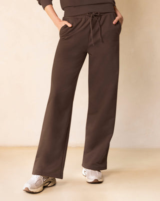 Pantalón bota amplia con elástico y tira anudable en cintura#color_c23-cafe-chocolate