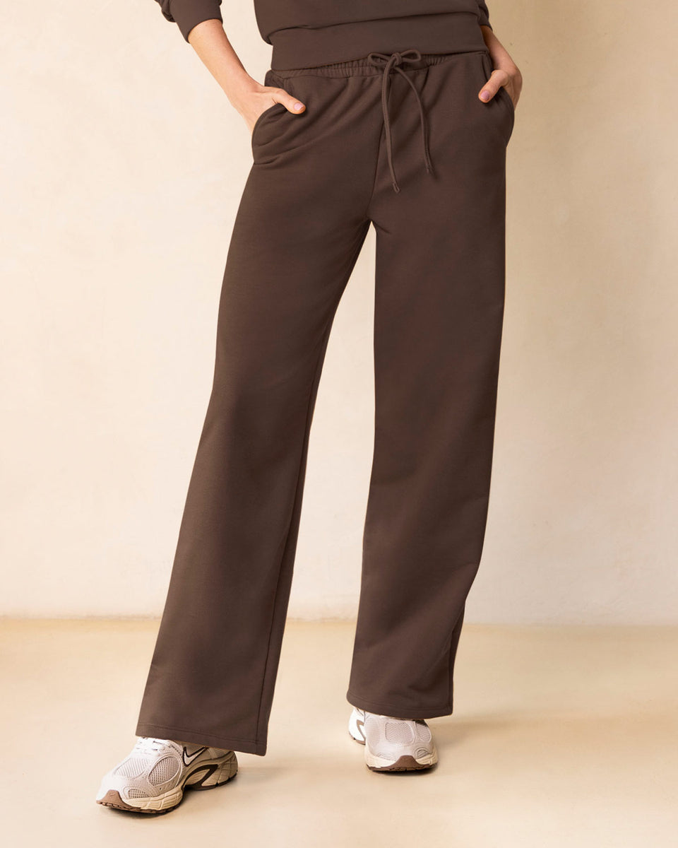 Pantalón bota amplia con elástico y tira anudable en cintura