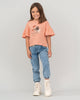 Camiseta manga corta con vuelo en bordes en mangas para niña#color_301-rosado