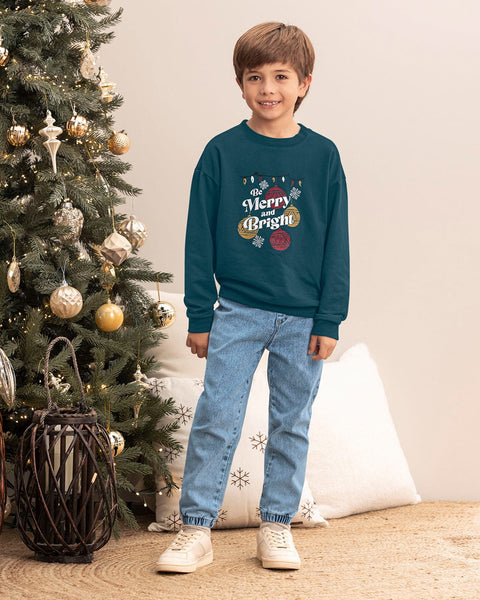 Camiseta manga larga infantil con estampado navideño#color_063-verde-botella