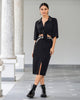 Falda midi con abertura en frente y bolsillos funcionales en frente y posterior#color_700-negro