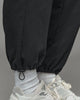 Pantalón cargo con bota elástica#color_773-negro