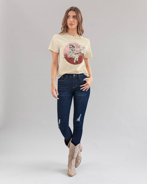 Jean skinny tiro medio con detalles desgastados#color_052-azul-medio