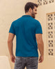 Camiseta tipo polo con botones  funcionales  con mangas y cuello tejido#color_578-azul-medio