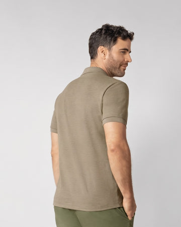 Camiseta polo manga corta con botones funcionales#color_a56-arena-jaspe