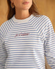 Camiseta manga larga cuello redondo con estampado localizado en frente#color_145-estampado-rayas