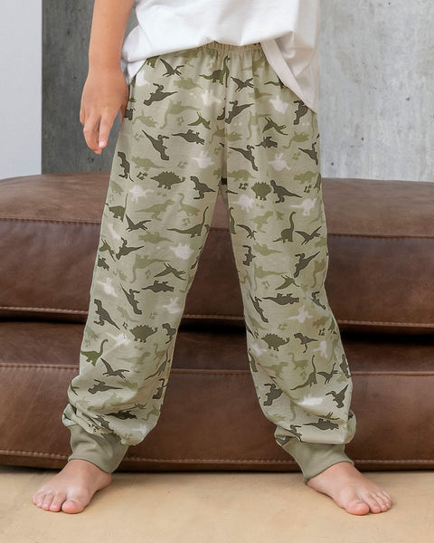 Pantalón de pijama para niño con estampado continuo#color_967-estampado-dinosaurio