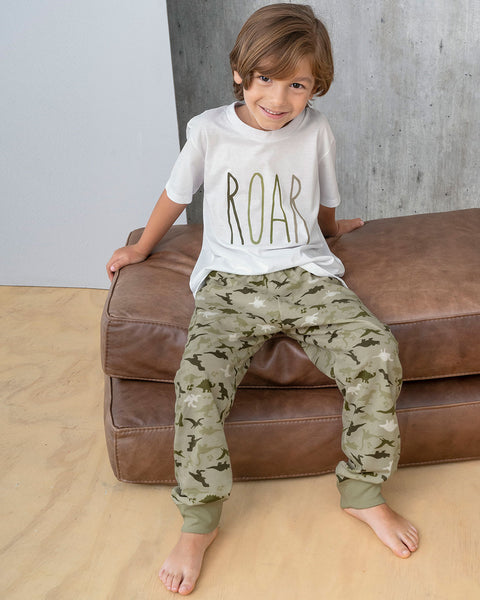 Pantalón de pijama para niño con estampado continuo#color_967-estampado-dinosaurio