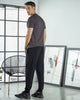 Pantalón exterior tipo jogger para hombre#color_700-negro